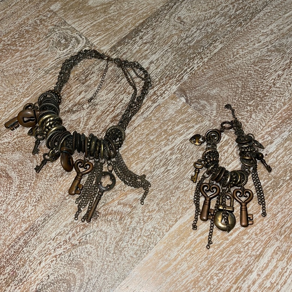 Charm bracelet and necklace keys with lockets